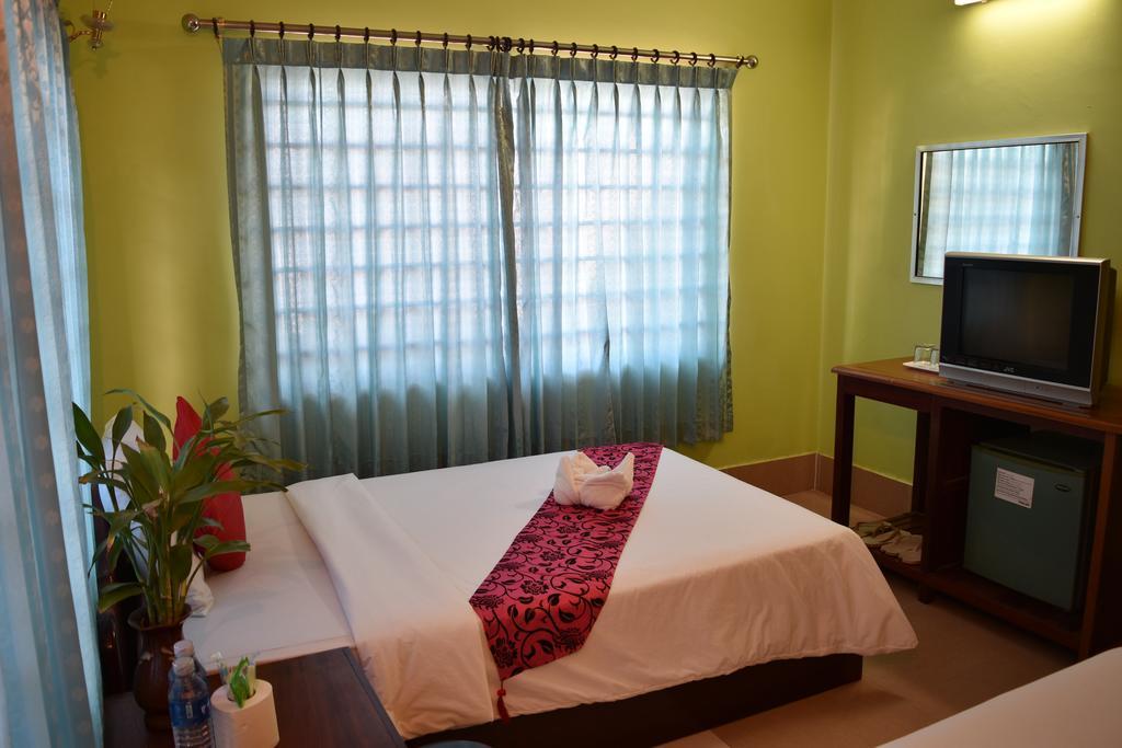 Ta Som Guesthouse & Tour Services Siem Reap Rum bild